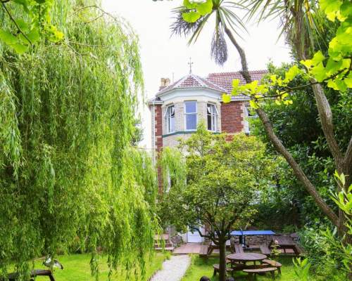 Enjoying the good weather in the garden of the Devon Language School