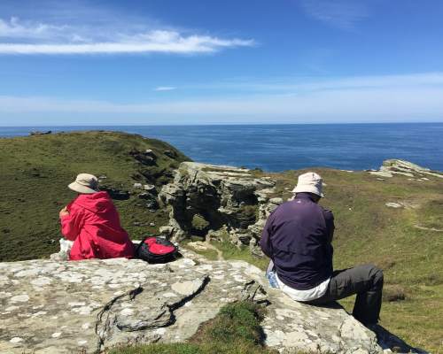 Taking a break from hiking to enjoy the beautiful view in Devon